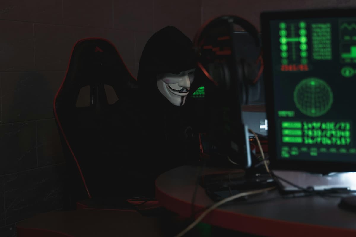 An image showing a cybersecurity professional working on a hacking simulation.